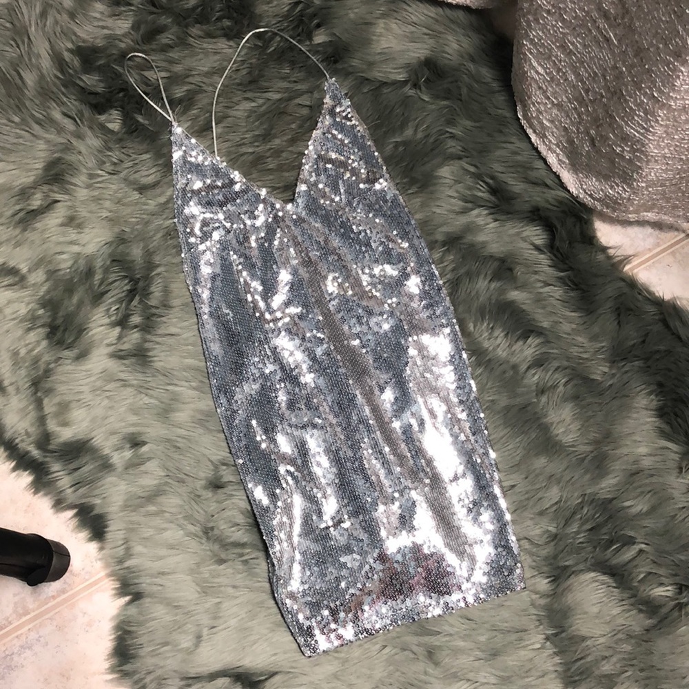 Sexy and flirty sequined mini dress or long top